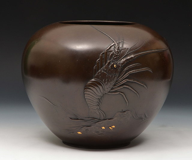 Appraisal: A Japanese bronze vaseMeiji periodsigned Seiun decorated in high relief