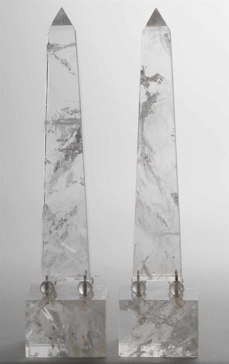 Appraisal: PAIR OF NEOCLASSICAL STYLE ROCK CRYSTAL OBELISKS Each pointed shaft