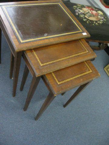 Appraisal: Nest of Mahogany Tables leather inserts tallest