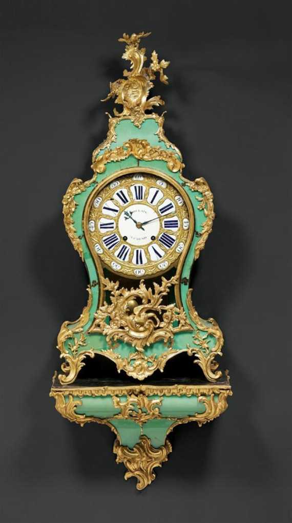 Appraisal: GREEN HORN CLOCK with plinth Louis XV the dial and