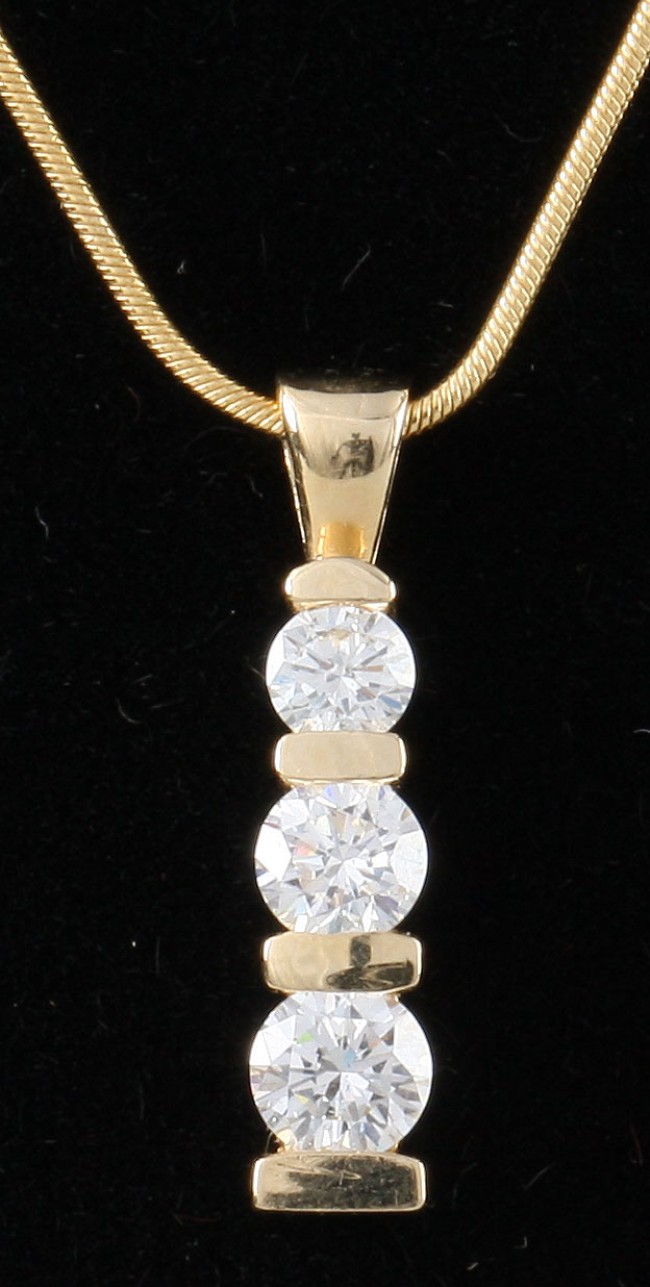 Appraisal: KY and diamond pendant with three diamonds approximately ctw S