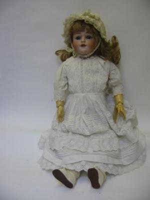 Appraisal: A Simon and Halbig bisque head doll with blue sleeping