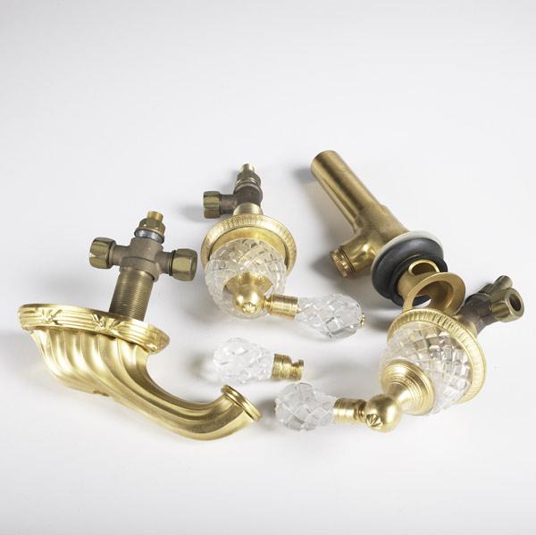 Appraisal: SHERLE WAGNER Ribbons and Reeds four piece gold plated faucet