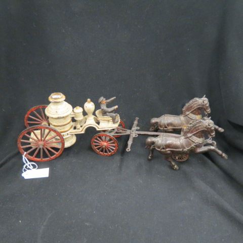 Appraisal: Antique Cast Iron Toy Fire Wagon horse drawn with rider