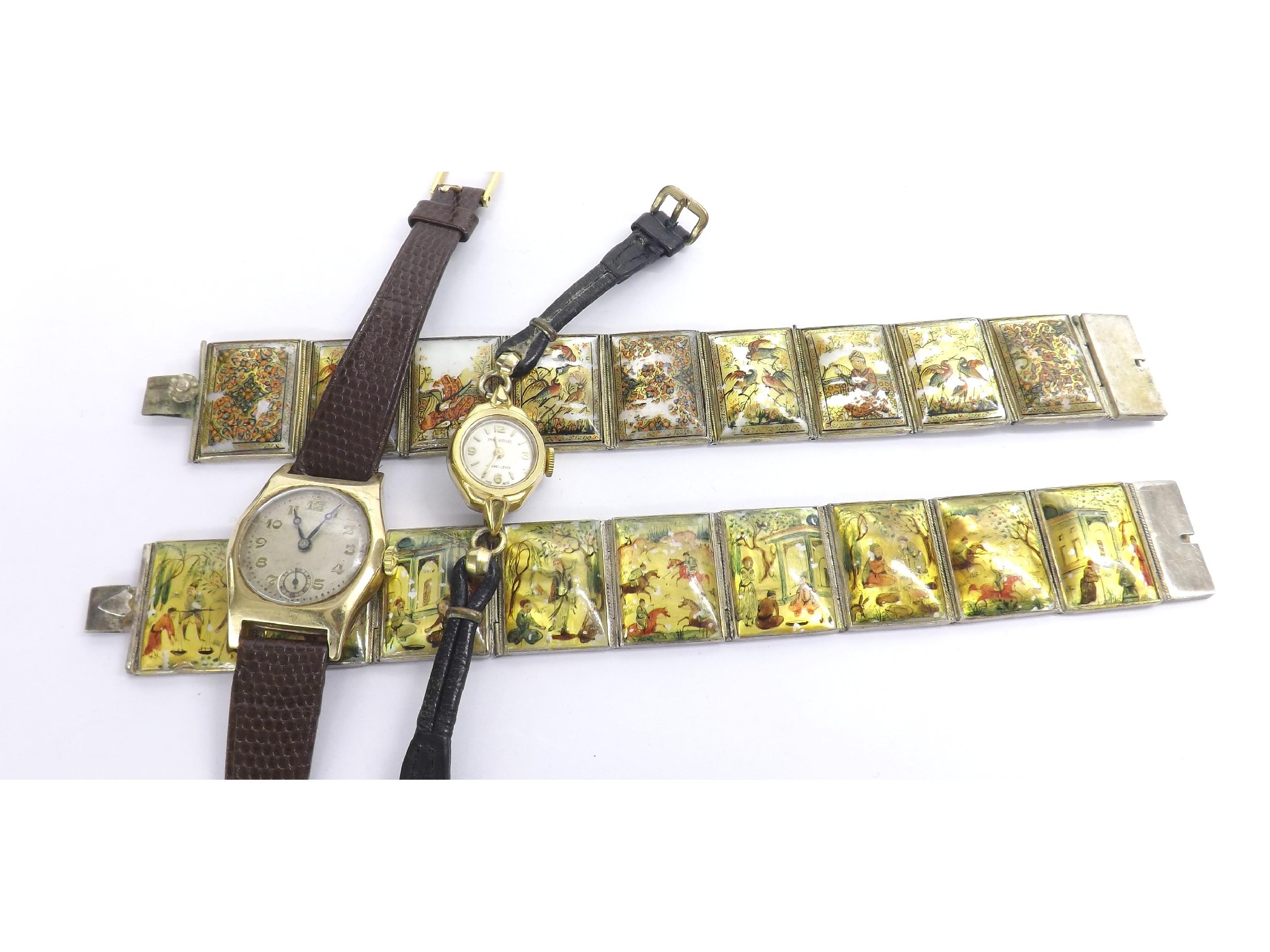 Appraisal: Lady's gold watch another lady's watch and two white metal