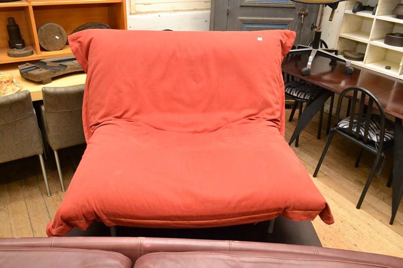 Appraisal: A LIGNE ROSET CHAIR WITH MATCHING FOOTSTOOL A LIGNE ROSET