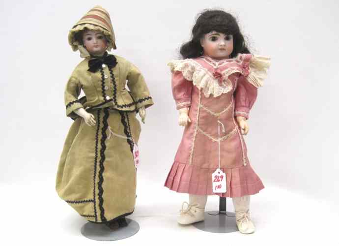 Appraisal: TWO GERMAN BISQUE SOCKET HEAD DOLLS both late th century