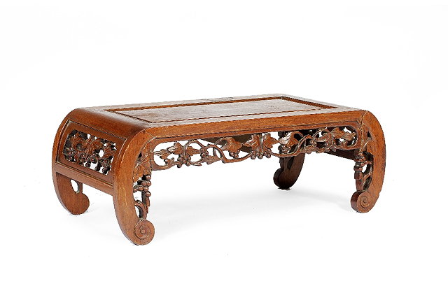 Appraisal: A Chinese hardwood opium tablewith carved frieze cm