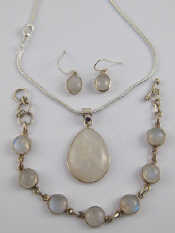 Appraisal: A white metal tests silver and moonstone suite of jewellery