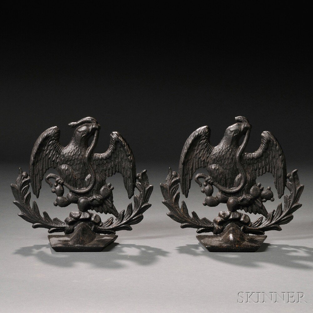 Appraisal: Pair of Cast Iron Eagle Doorstops th century each half-round