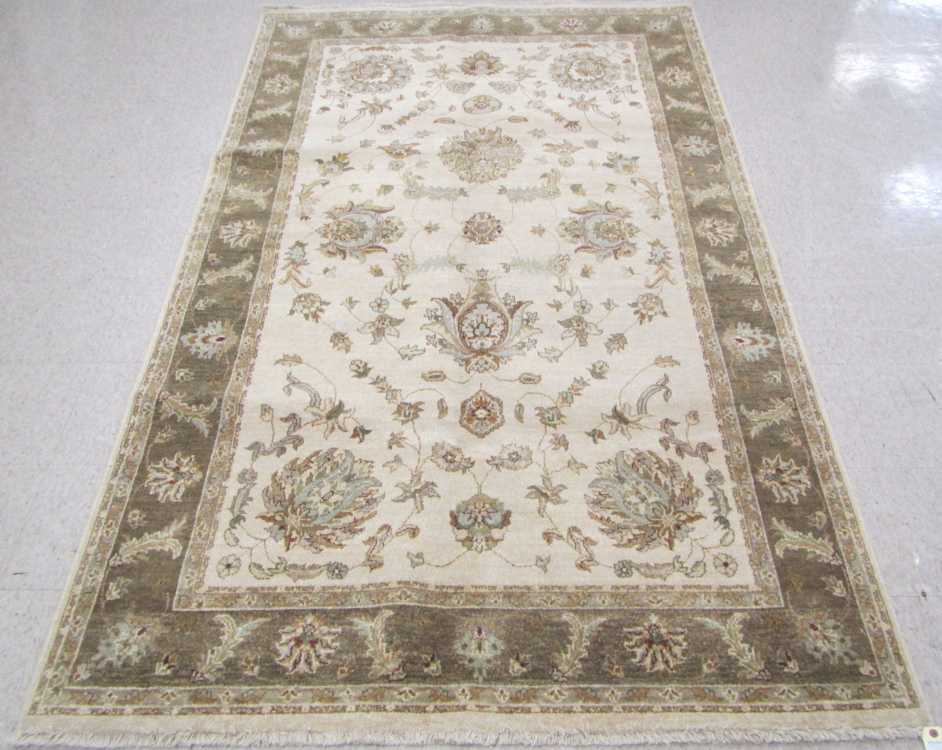 Appraisal: HAND KNOTTED ORIENTAL CARPET Indo-Persian floral and floral arabesque decoration