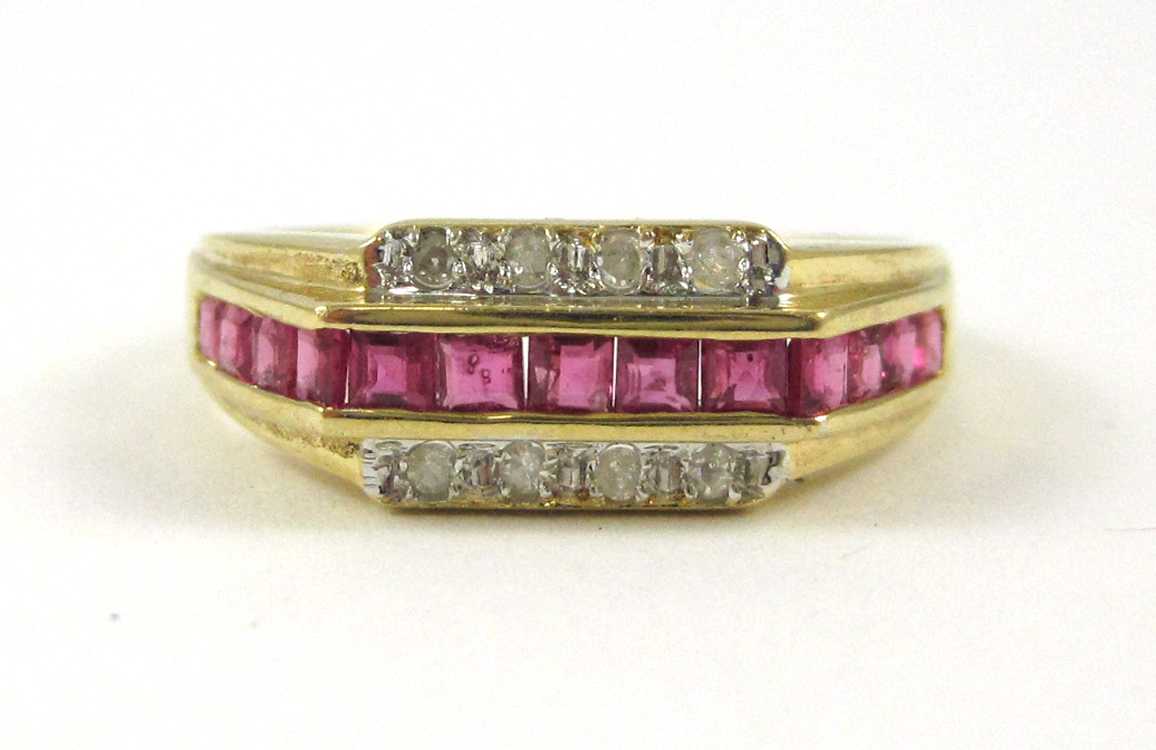 Appraisal: RUBY DIAMOND AND FOURTEEN KARAT GOLD RING with two rows