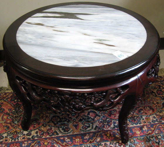 Appraisal: ROUND COFFEE TABLE Chinese th century having a circular inset