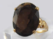 Appraisal: A carat gold smokey quartz ring stone approx x mm