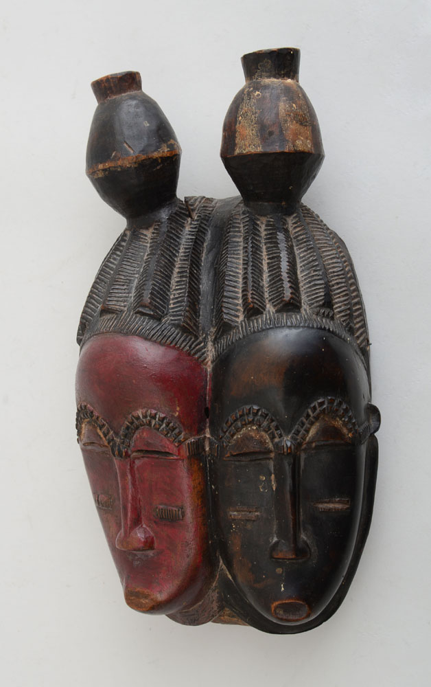 Appraisal: SENUFO CARVED AND PAINTED WOOD DOUBLE FACE MASK With almond-shape