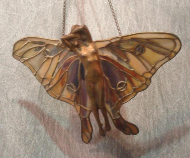 Appraisal: Art Nouveau Leaded Glass Nude Winged Fairy Hairline cracks to