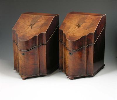 Appraisal: A pair of George III mahogany knife boxes with serpentine