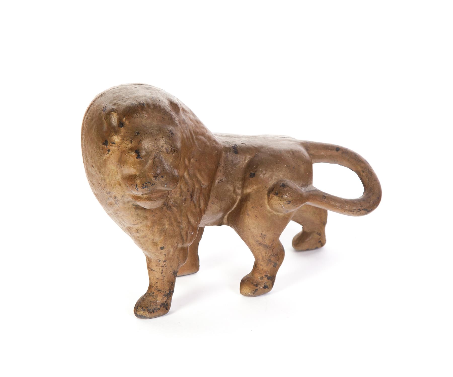 Appraisal: CAST IRON LION DOOR STOP American th century Gold overpaint