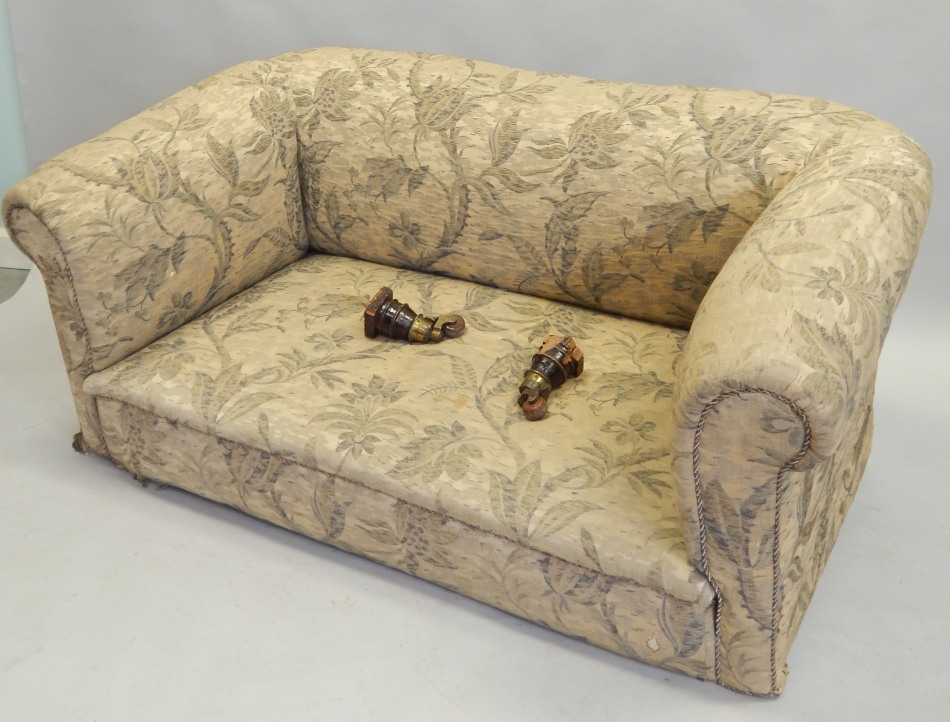 Appraisal: A Victorian mahogany Chesterfield later upholstered in floral fabric on