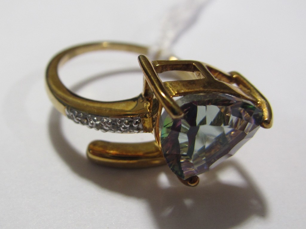 Appraisal: Nine carat gold mystic topaz and diamond set dress ring