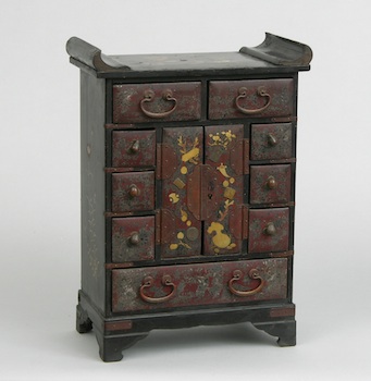 Appraisal: A Japanese Lacquer Miniature Cabinet An antique Japanese lacquer miniature