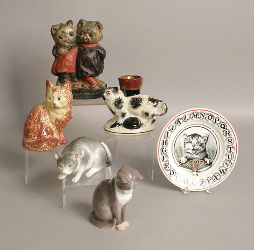 Appraisal: Cast iron cat doorstop h together with four porcelain and