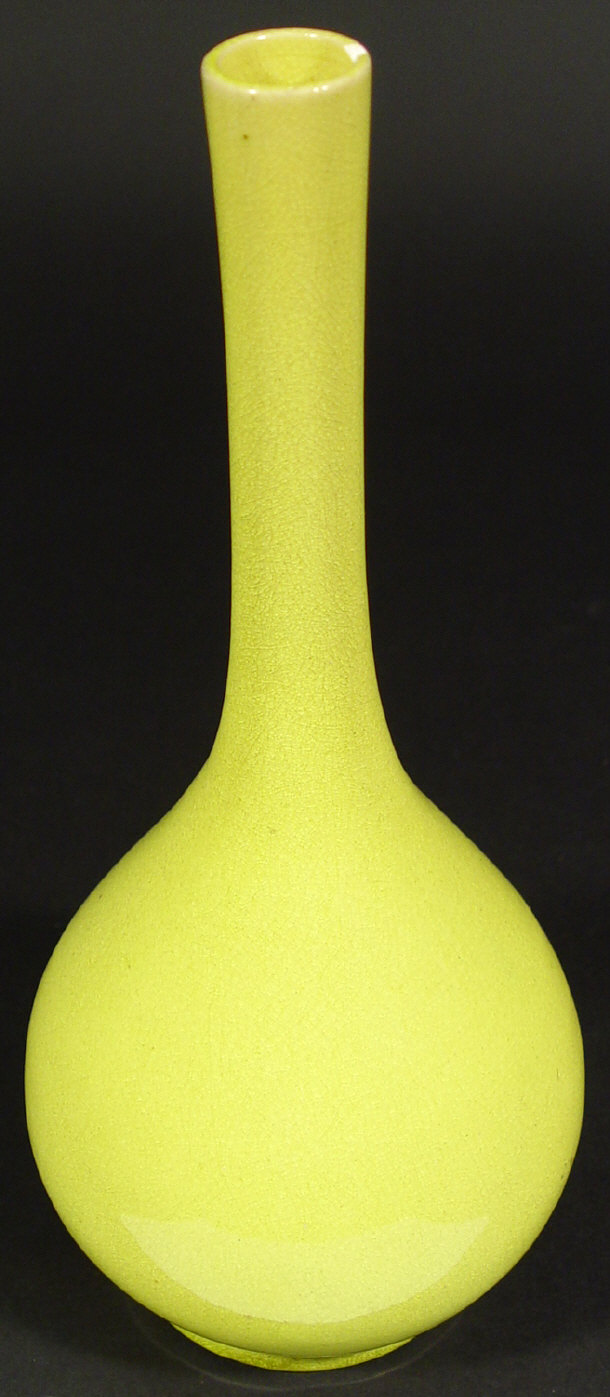 Appraisal: Oriental pottery bottle vase decorated in a yellow glaze cm