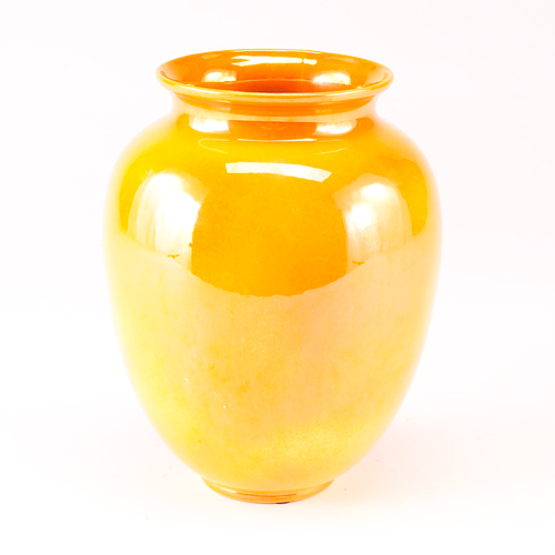 Appraisal: COWAN Ovoid vase in orange lustered glaze Stamped Cowan