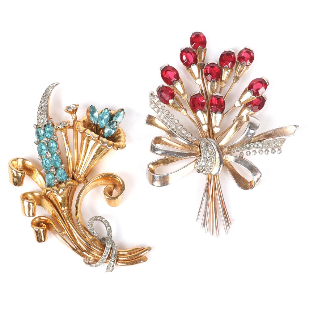 Appraisal: TWO RETRO GOLD TONE AND DIAMANTE FLOWER SPRAY PINS ONE