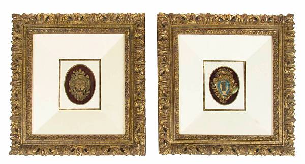 Appraisal: A pair of Italian embroidered padded silkwork armorial panels panel