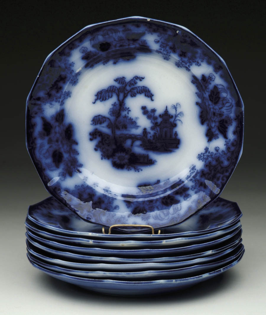 Appraisal: SET OF EIGHT FLOW BLUE PLATES IN THE CHUSAN PATTERN