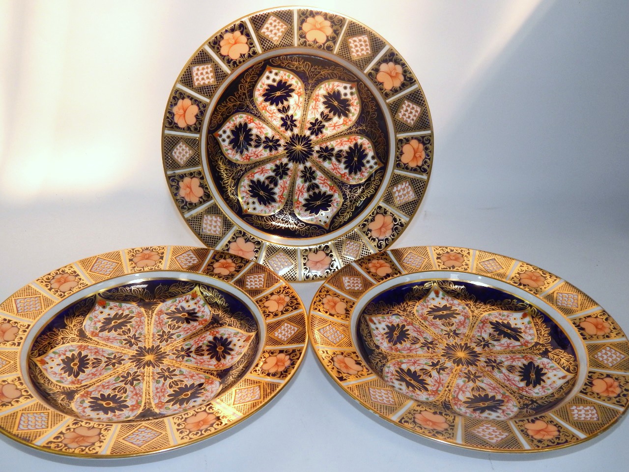 Appraisal: A set of seven Royal Crown Derby porcelain soup plates