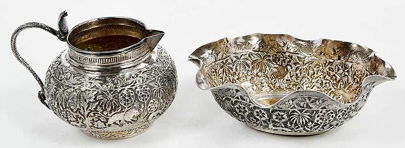 Appraisal: Persian Silver Bowl and Creamer th century figures trees and