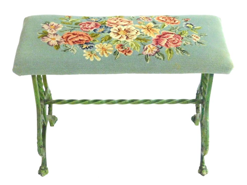 Appraisal: Victorian iron base stool with needlepoint covered seat painted wrought