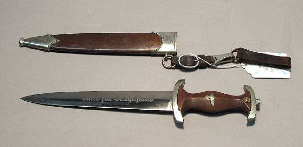 Appraisal: A German SA dagger The inch double edged blade marked