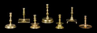 Appraisal: Seven Continental brass and bell metal candlesticks th- th c