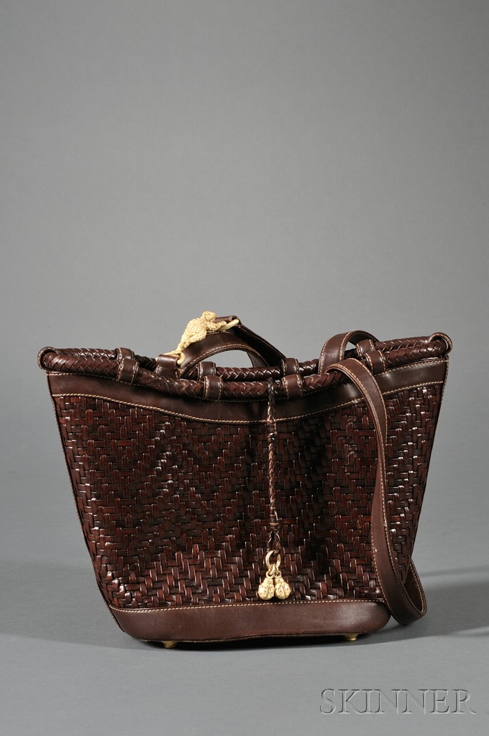 Appraisal: Brown Leather Handbag Kieselstein-Cord the woven exterior on conforming gold-tone