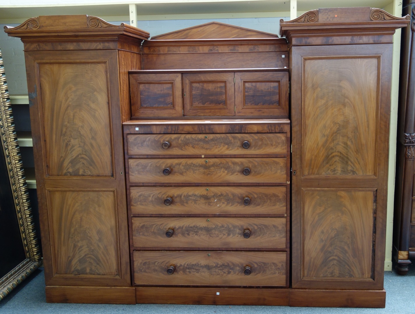 Appraisal: An early th century mahogany Sentry compactum wardrobe the pair