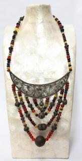 Appraisal: Tribal Filigree Eclectic Beads Necklace A filigree openwork crescent on