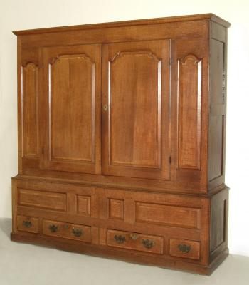 Appraisal: A GEORGE III OAK PRESS CUPBOARD with mahogany crossbanding moulded