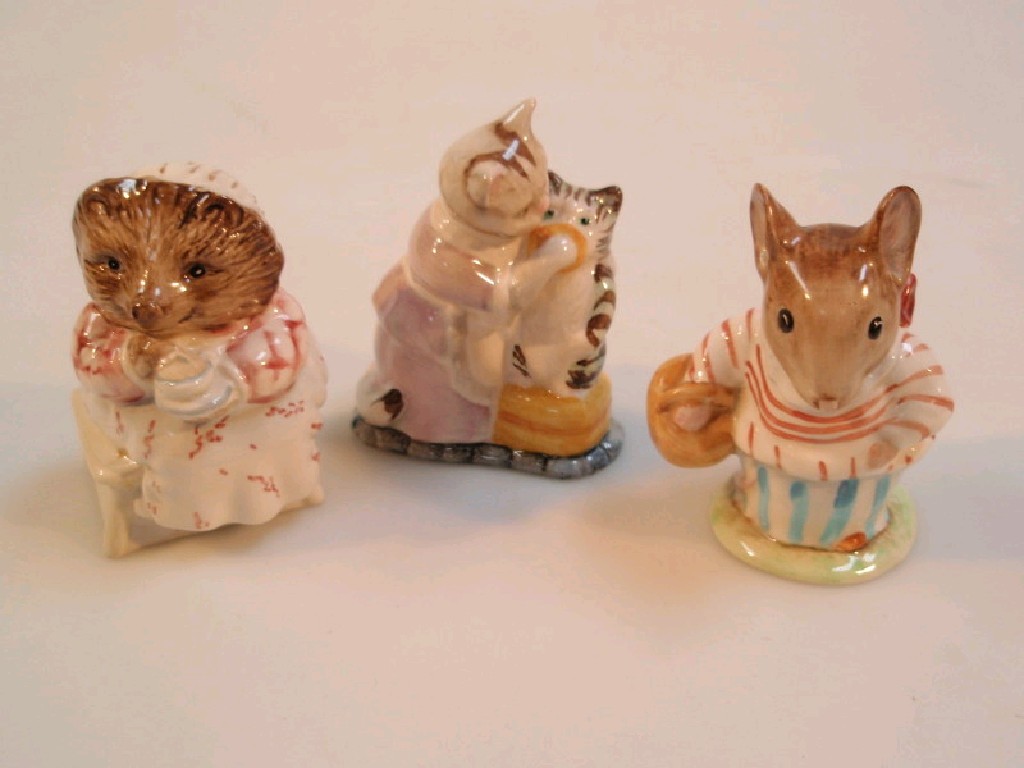 Appraisal: Three Beswick Beatrix Potter characters Mrs Tiggywinkle Tabitha Twitchett and