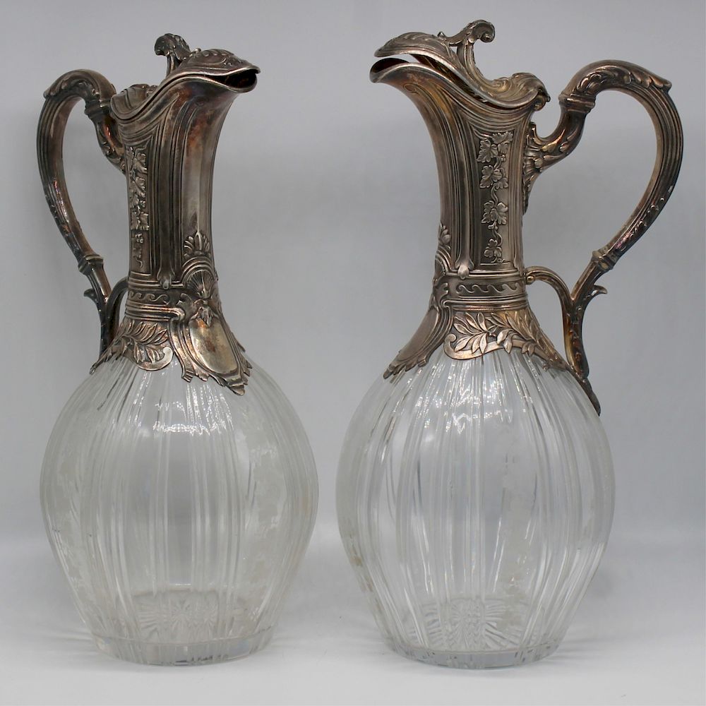 Appraisal: SILVER Pair of Vaguer French Silver Mounted Claret Jugs Pair