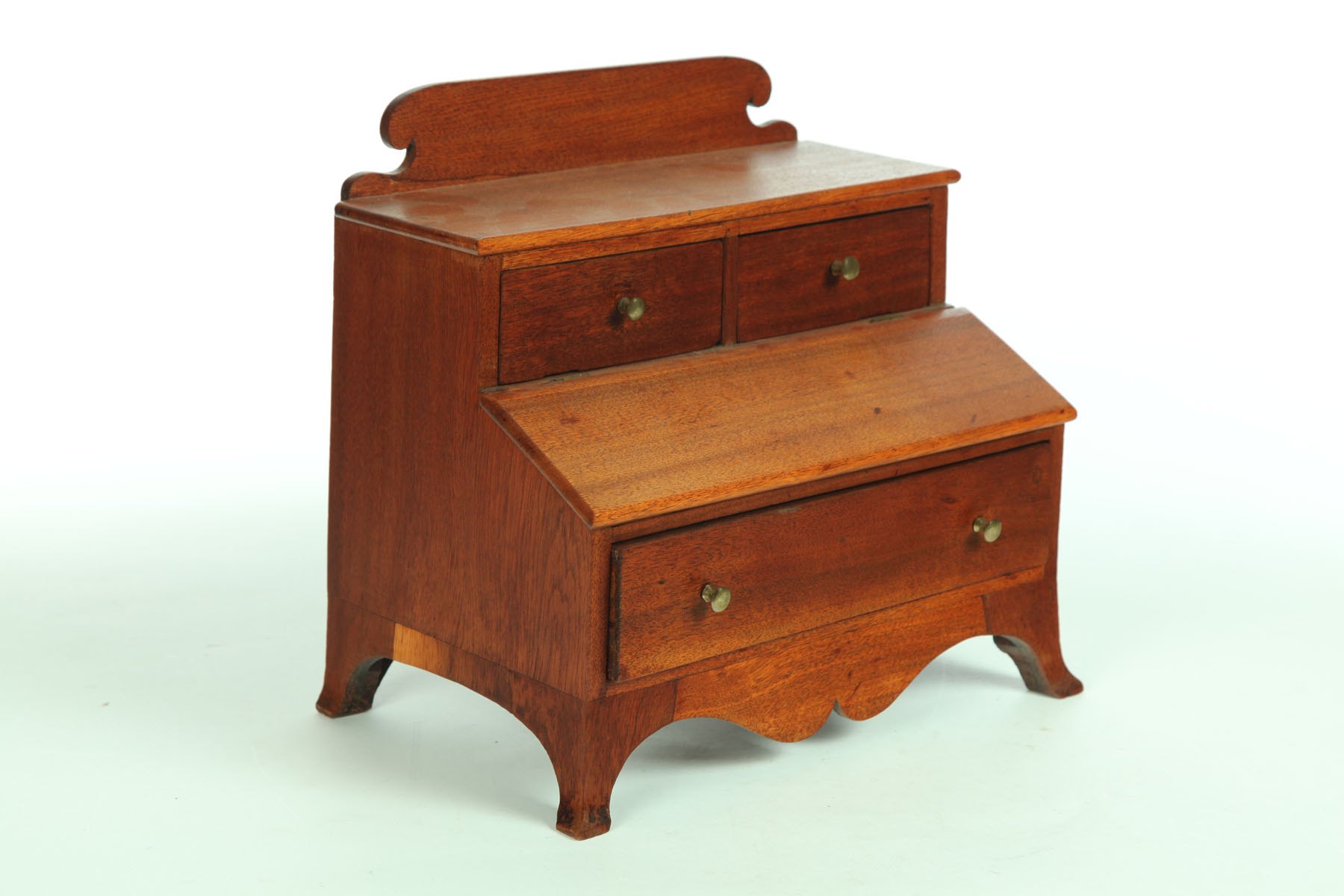 Appraisal: MINIATURE DESK American early th century walnut poplar secondary Miniature