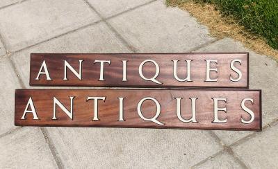 Appraisal: A pair of signs for 'Antiques' with enamel lettering mounted