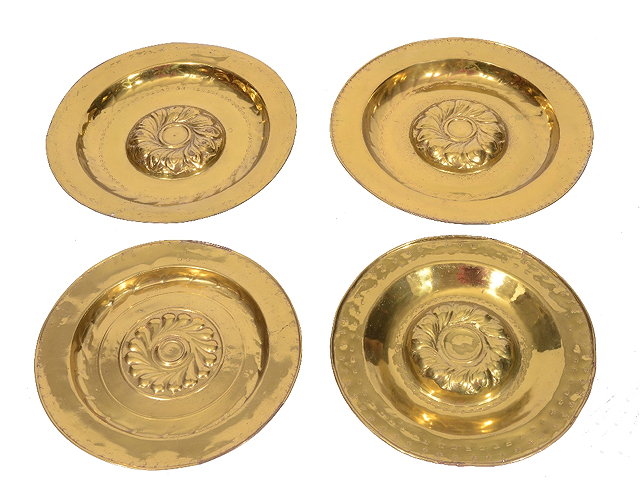 Appraisal: A GROUP OF FOUR GERMAN BRASS ALMS DISHES each with