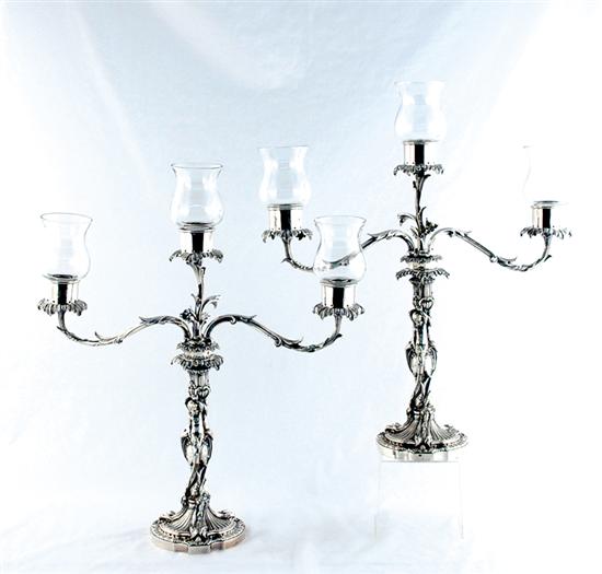 Appraisal: Pair Elkington silverplate candelabra circa elevated on rococo style sweeping