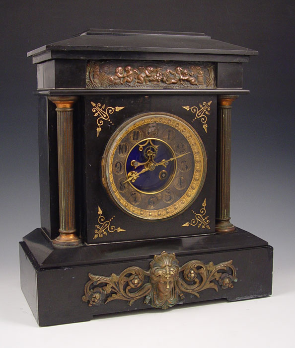 Appraisal: BLACK MARBLE AND BRASS MANTLE CLOCK Heavy black marble with