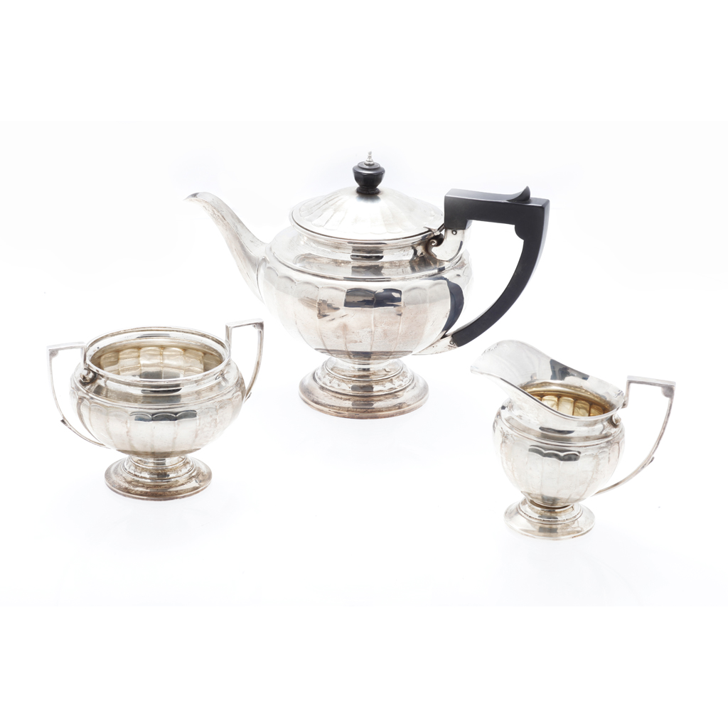 Appraisal: A three piece tea service GMC Birmingham circular form panelled