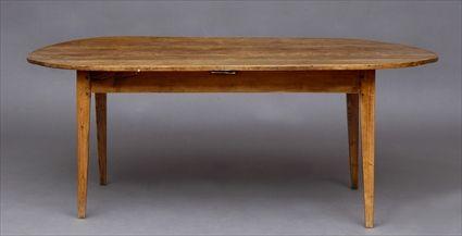 Appraisal: FRENCH PROVINCIAL ELM DINING TABLE The oval overhanging top above