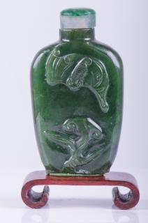 Appraisal: Chinese Spinach Jade Snuff Bottle Relief carved with a flying